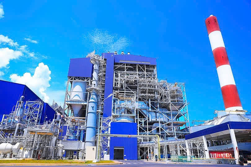 A large building with blue and white structuresAI-generated content may be incorrect.
