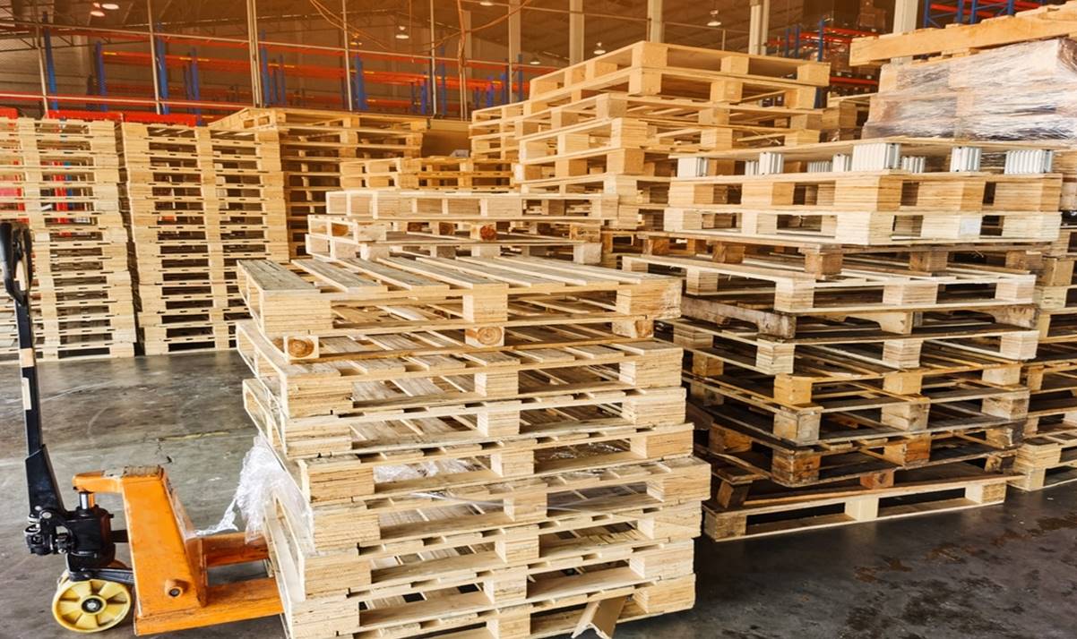 A pallets stacked in a warehouseAI-generated content may be incorrect.